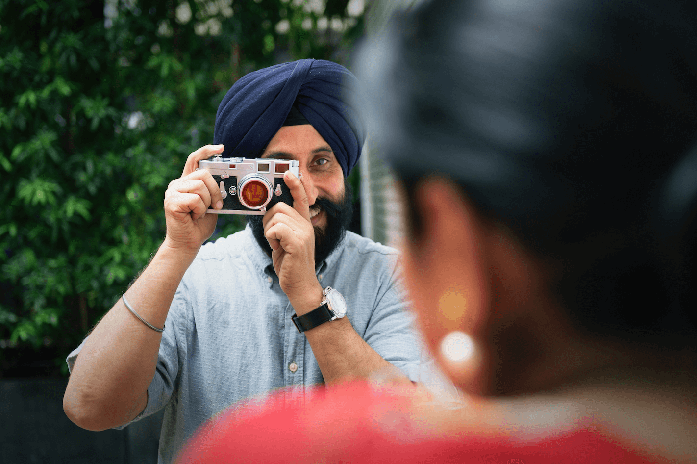 Indian man taking a photo