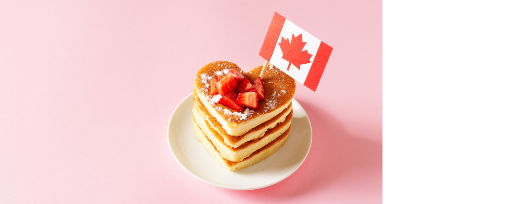 Stack of pancakes with strawberries and Canadian flag by denira21